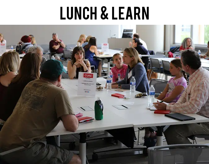 group of people around a table for CURE Epilepsy Day of Science Lunch and Learn