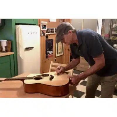 Cure’s Charity Auction Features Guitars Autographed By Rock & Roll Hall-of-famers And Country Music Legends