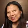 Dr. Katty Kang smiling at camera